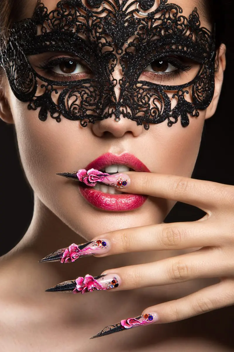 beautiful-girl-in-mask-with-long-nails